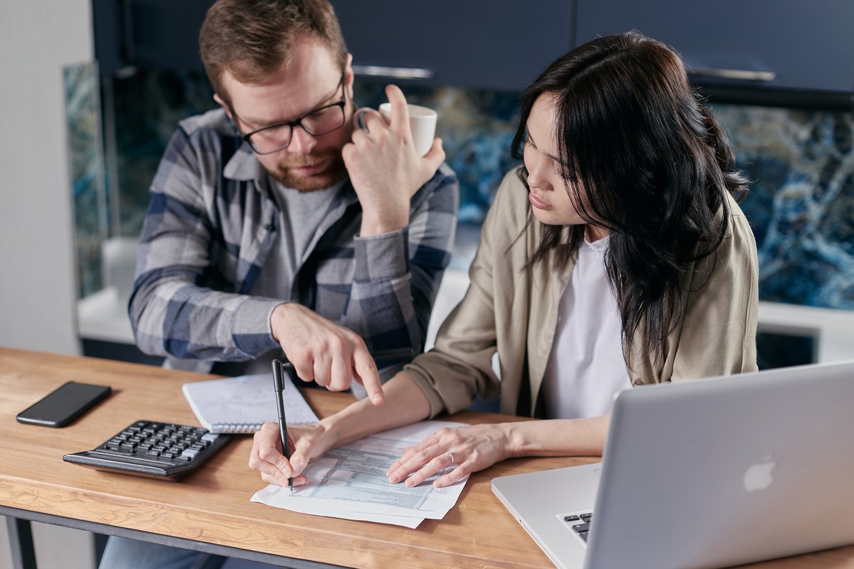 Couple Calculating all their Bills